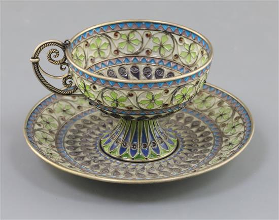 An early 20th century Norwegian silver, enamel and plique a jour cup and saucer, by Marius Hammer, saucer 10.6cm.